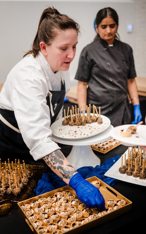 person plating food